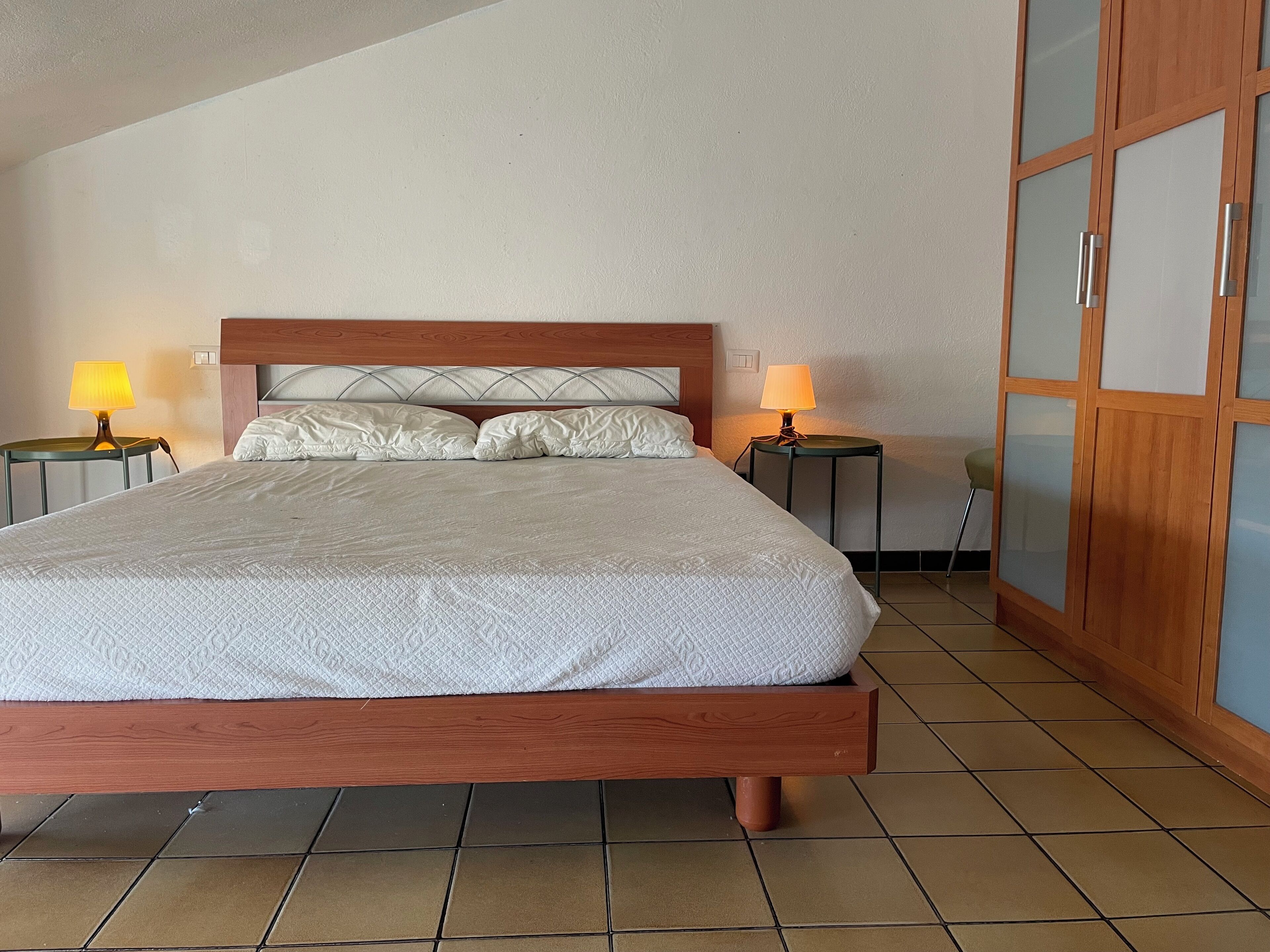 2 slaapkamers, een strijkplank/strijkijzer, beddengoed