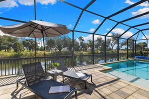 Outdoor pool, a heated pool - Seaside Villa Golfers Delight South facing, quiet location, privacy, heated pool (Cape Coral)
