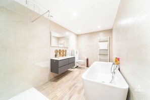 Shower, hair dryer, towels, soap