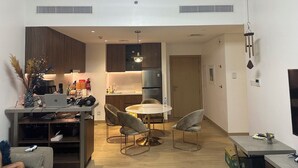Signature Apartment, 1 Bedroom, Non Smoking, Sea View | Living room - La Cote B5 110 (Dubai)