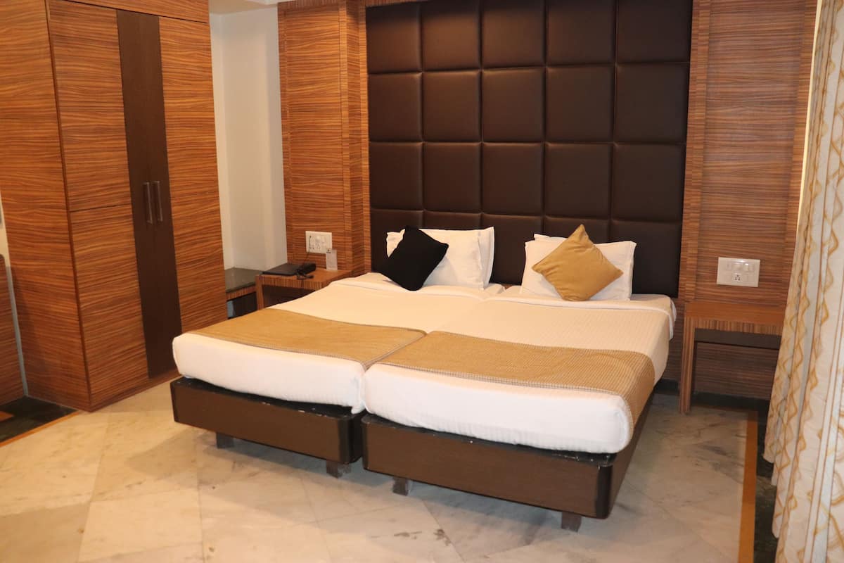 Habitación clásica con 1 cama doble o 2 individuales, vistas a la ciudad | Wifi gratis