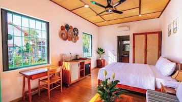 Basic Villa, 3 Bedrooms, Garden View | Desk, iron/ironing board