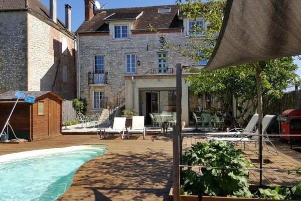 Seasonal outdoor pool, open 9:00 AM to 10:00 PM, pool umbrellas