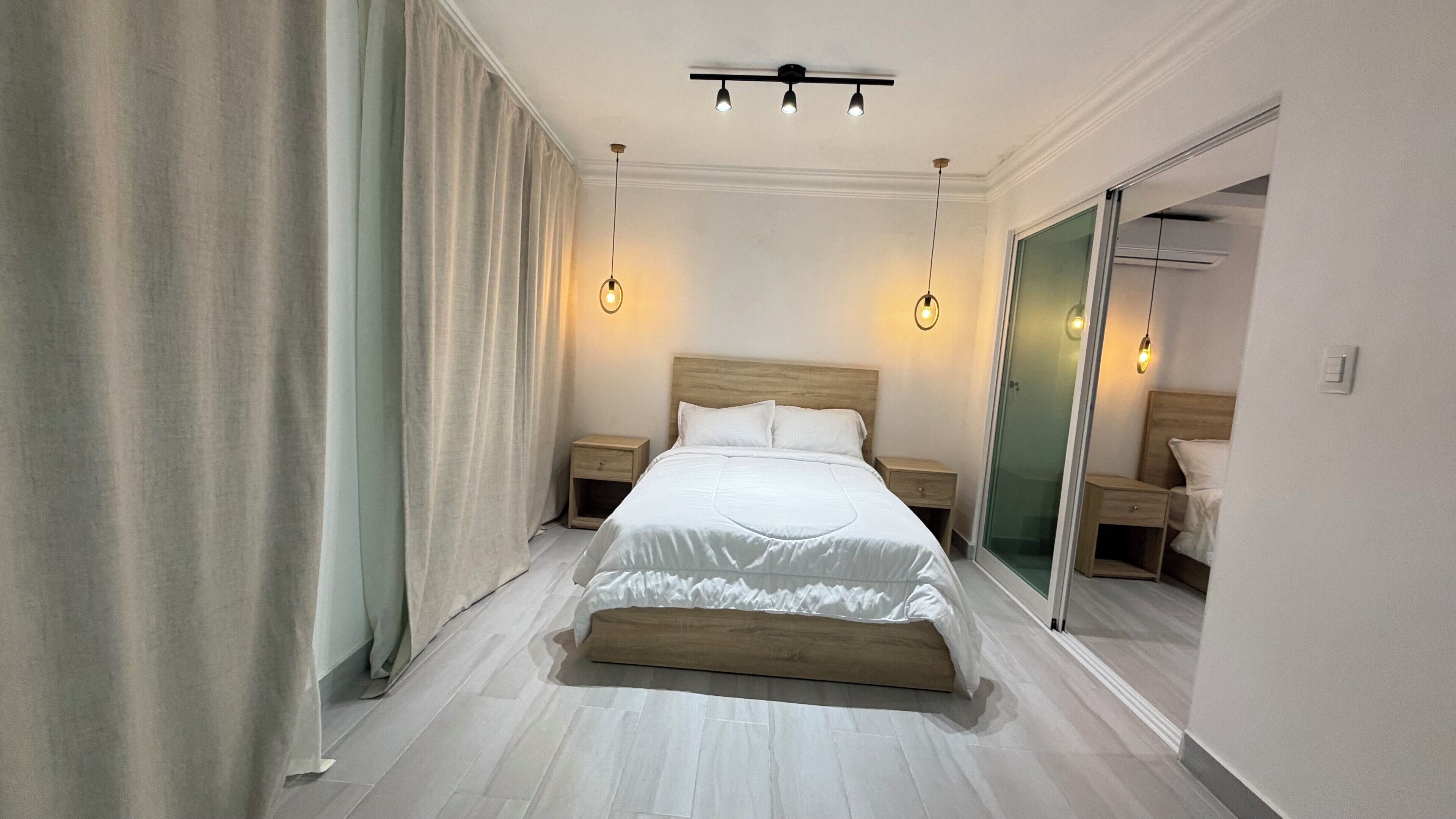 Kamar Double Keluarga, balkon, pemandangan pantai | Seprai premium, selimut bulu angsa, dan bantalan ekstra lembut