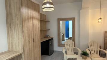 Studiosvit Deluxe - 1 sovrum - balkong - utsikt mot staden | Vardagsrum | 60-tums plasma-tv med digitalkanaler och golvvärme