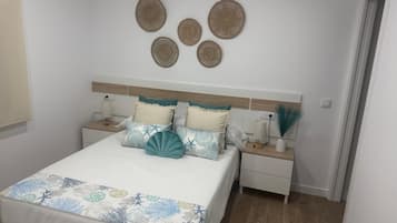2 dormitorios, tabla de planchar con plancha, wifi y ropa de cama