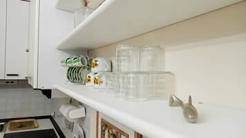 Fridge, stovetop, coffee/tea maker, electric kettle