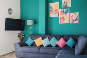 Deluxe Apartment, Beach View | In-room safe, individually decorated, individually furnished