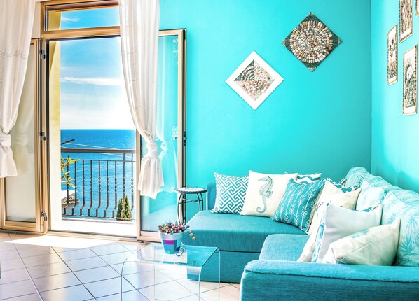 Deluxe Apartment, Ocean View, Beachfront | Living area - Cohen Smart House (Taormina)