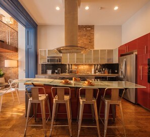 Fridge, microwave, oven, stovetop - Village Art Loft by StayHaus | 1BR w/ Private Garden (New York)