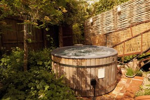 Cottage | Outdoor spa tub - The White House, Riverside Retreat (Norwich)