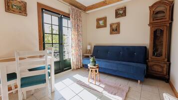 Apartment, Balcony, Lake View | Living area