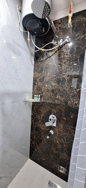 Family Quadruple Room, Multiple Beds, Balcony | Bathroom | Shower, hair dryer, slippers, towels - Hotel Jay Jay (Aizawl)