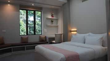 Minibar, desk, blackout curtains, iron/ironing board