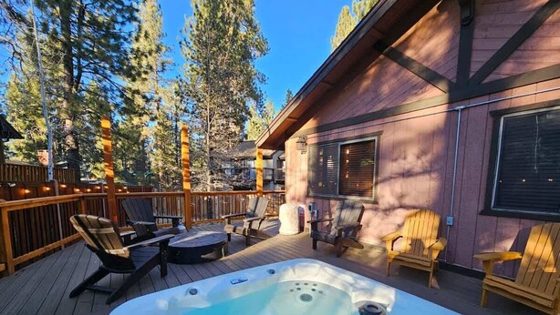 A hot tub on a wooden deck with lounge chairs and a wooden fence. - Slopeside Cabin C W Hot Tub & Slope View Parking (Big Bear Lake)