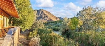 Riverfront cabin with a fitness center and a hot tub