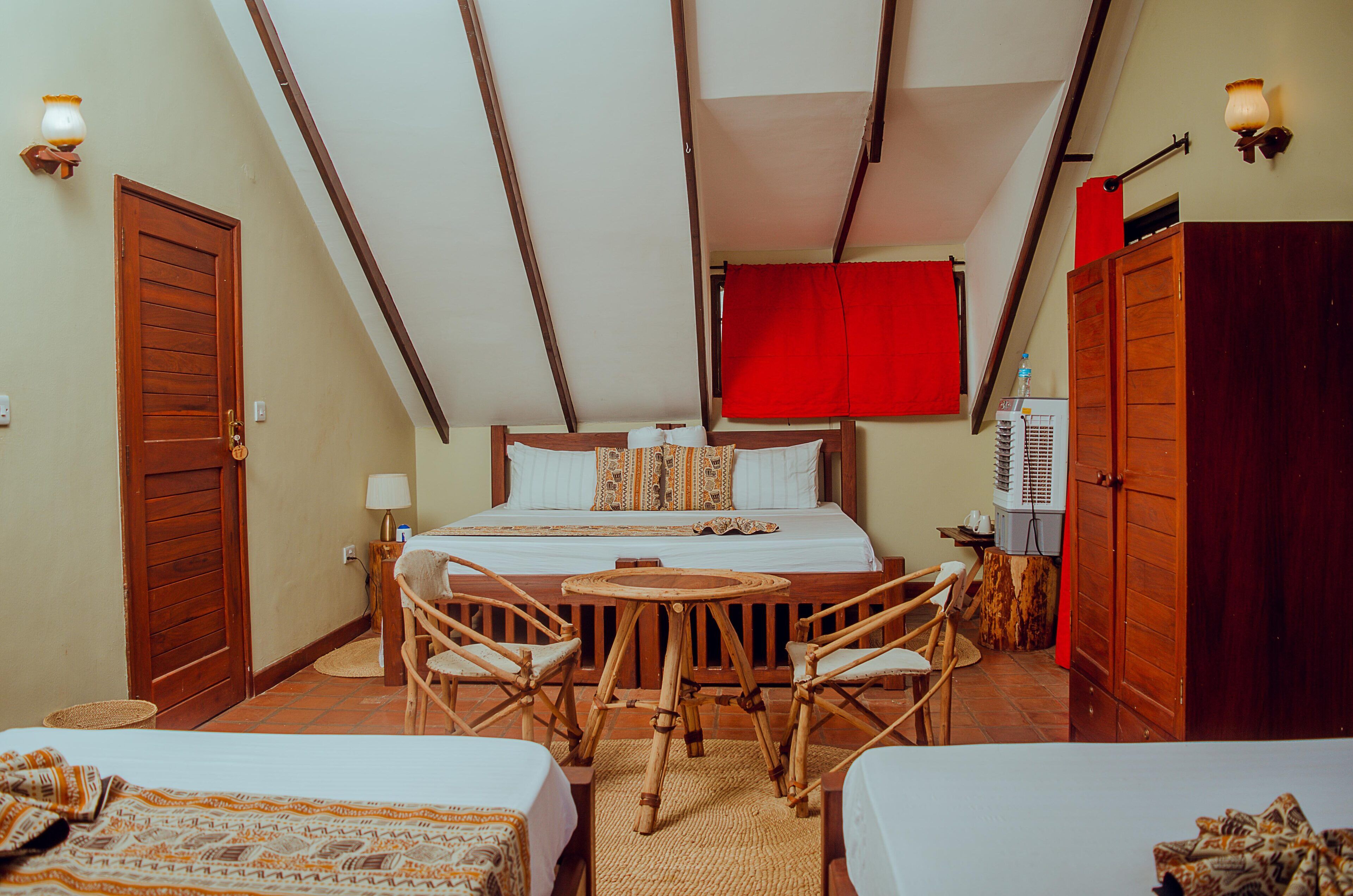 Standard Quadruple Room, Balcony, Garden View | Free WiFi, bed sheets