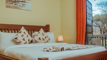 Habitación doble | Cortinas blackout, wifi gratis y ropa de cama