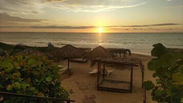On the beach, sun loungers, beach umbrellas, beach massages