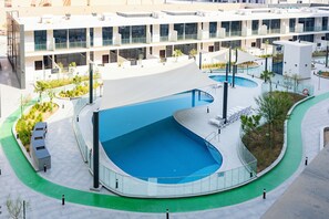 Outdoor pool - 106 Bloomfields Executive STU Gate Masdr (Madinat Zayed)