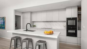 Coffee/tea maker, fridge, microwave, oven