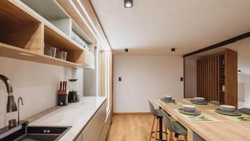 Suite Deluxe, bain à remous | Cuisine privée