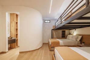 A modern bedroom with a bunk bed, a bedside table, a small bedside plant, and a wooden shelving unit. - Hotel Green House (Salento)