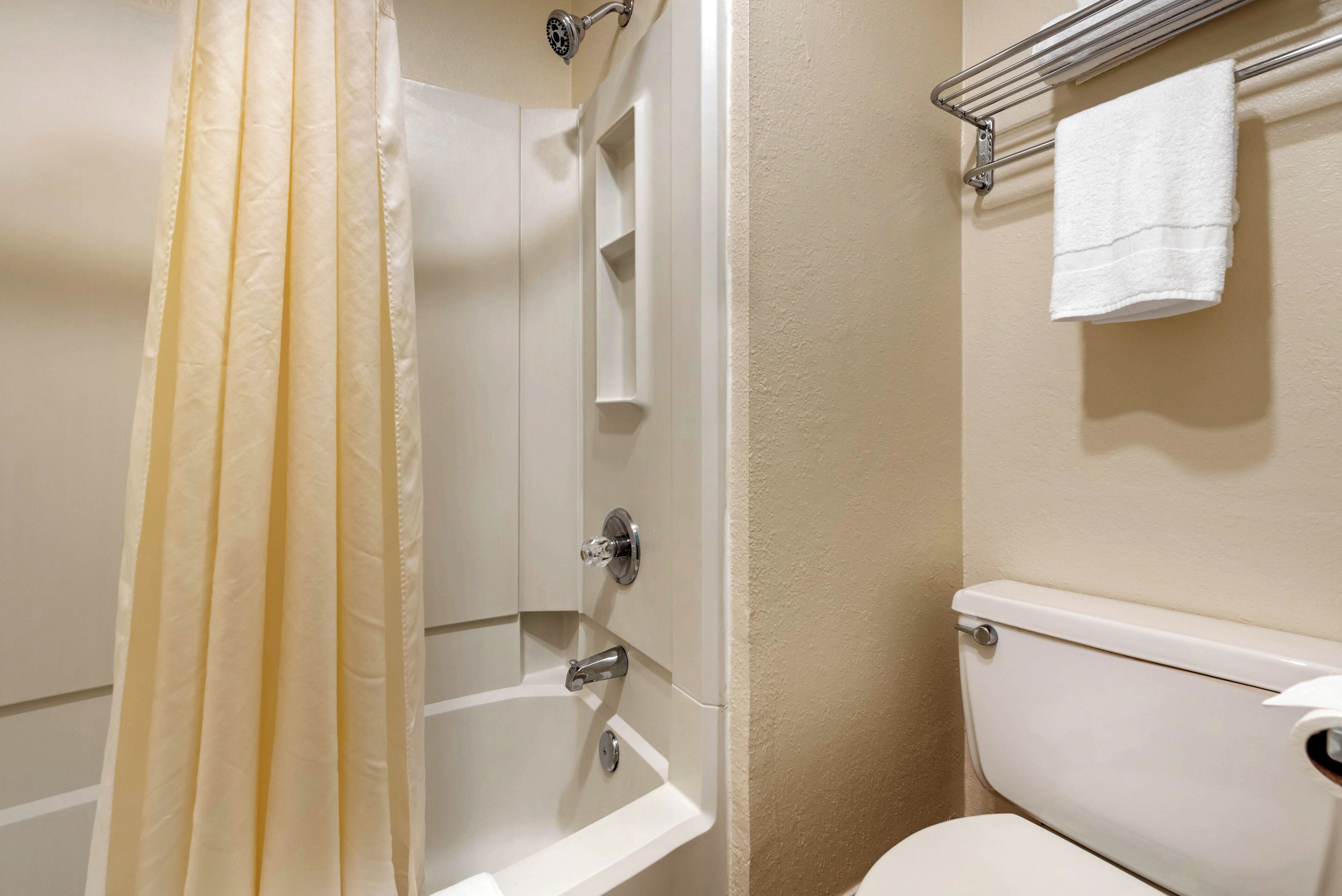 Separate tub and shower, hair dryer, towels, soap
