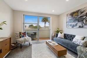 Living area - Right Opposite the Beach! (Orewa)