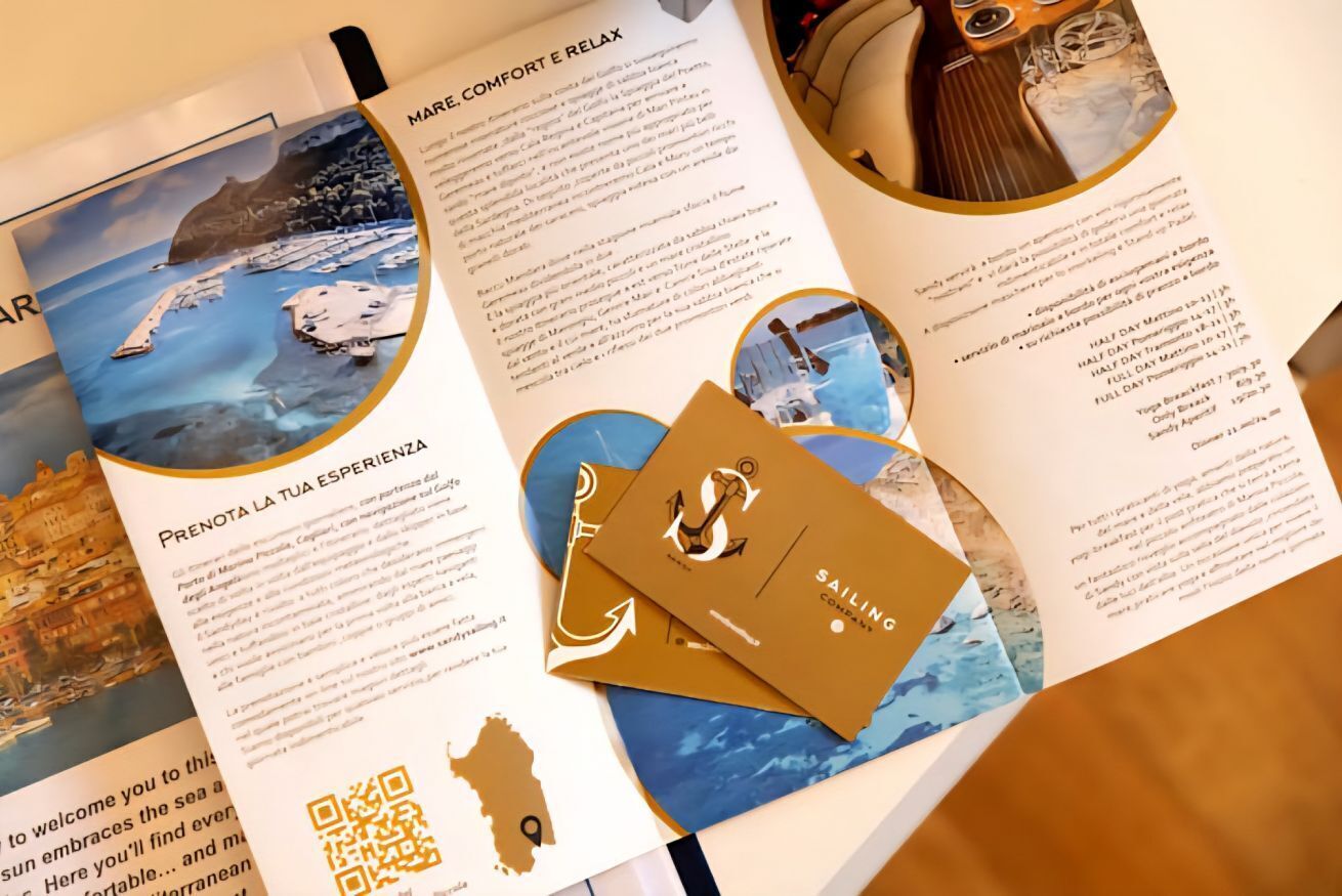 A brochure with text and images of a coastal area, a boat, and a QR code.