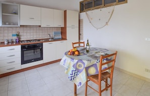 Fridge, stovetop, cookware/dishes/utensils