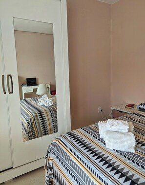 Acesso à internet, roupa de cama