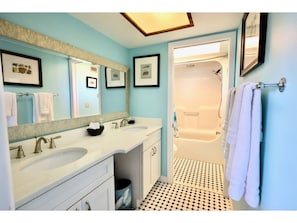 Shower, towels, soap, toilet paper