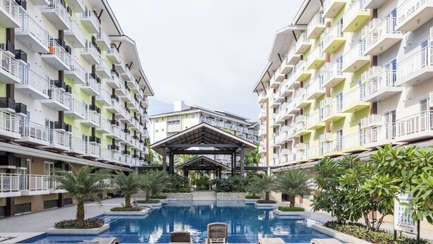 Condo, Accessible, Balcony | Pool - Stylish Condo 3-minutes to Airport, Poolview at Amani Grand Resort Residences (Lapu-Lapu)
