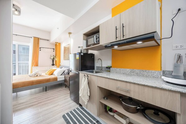 Condo, Accessible, Balcony | Interior - Stylish Condo 3-minutes to Airport, Poolview at Amani Grand Resort Residences (Lapu-Lapu)
