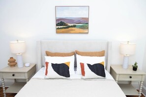 4 habitaciones, tabla de planchar con plancha y cuna de viaje 