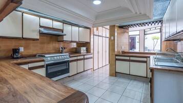 Fridge, coffee/tea maker, cookware/dishes/utensils