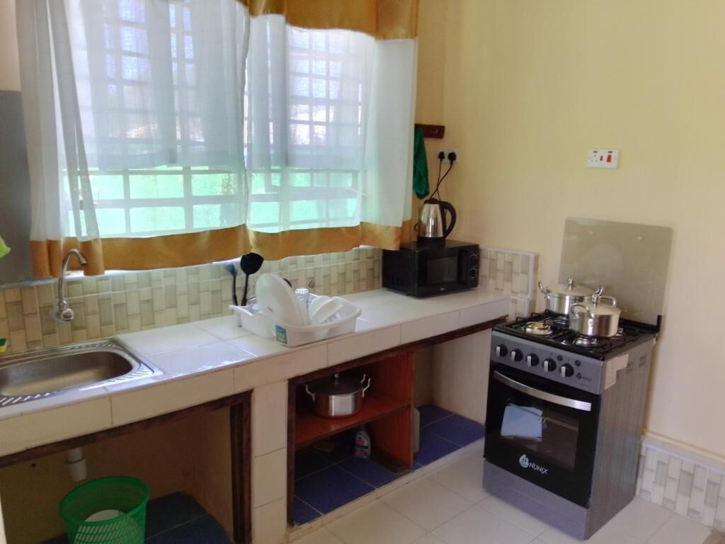 Family Chalet, Garden View | Private kitchen | Fridge, microwave, cookware/dishes/utensils