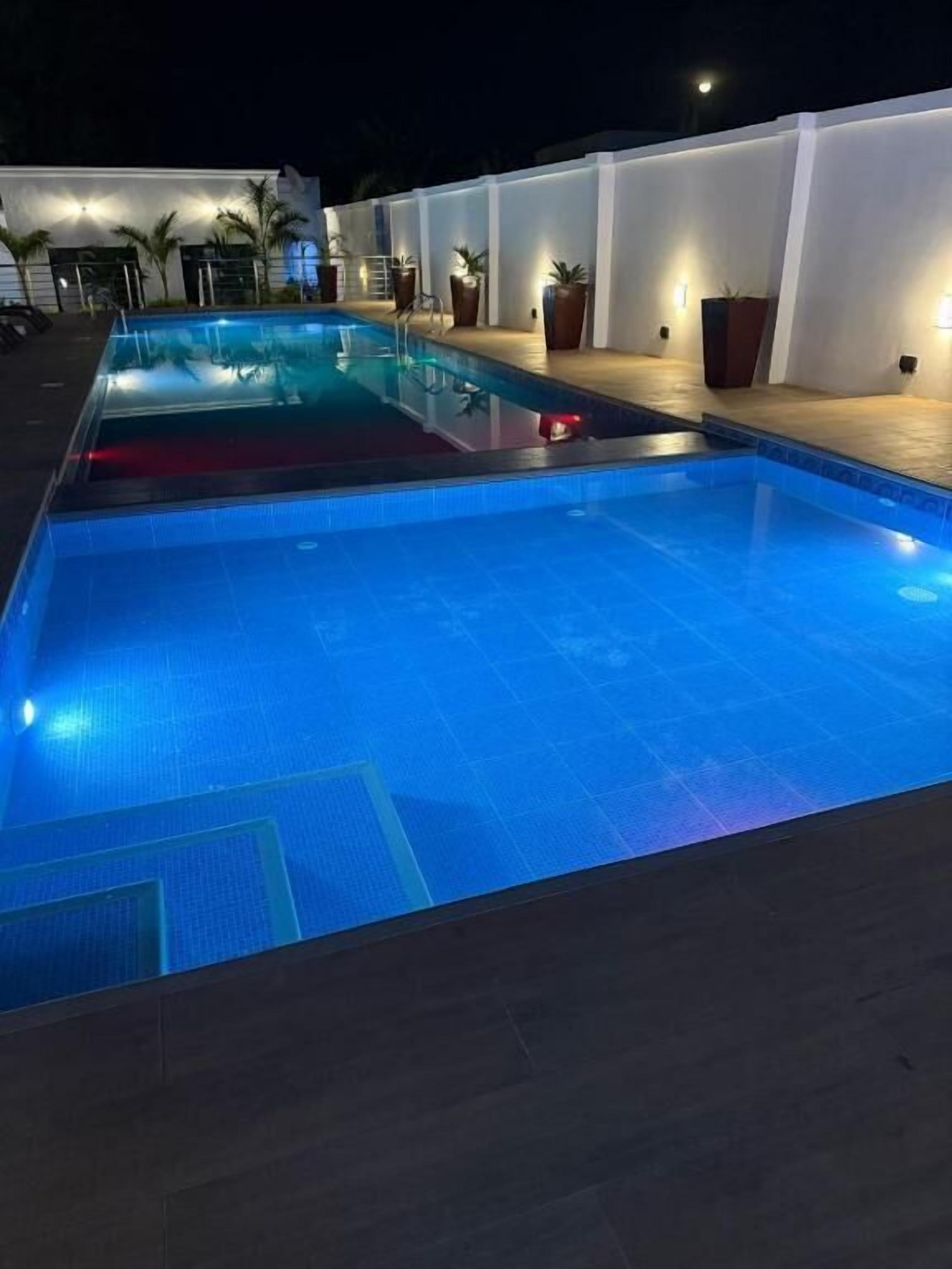 Outdoor pool, sun loungers, lifeguards on site