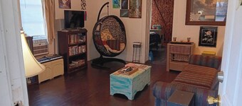 Cozy 3-bedroom cabin with AC and full kitchen and laundry.