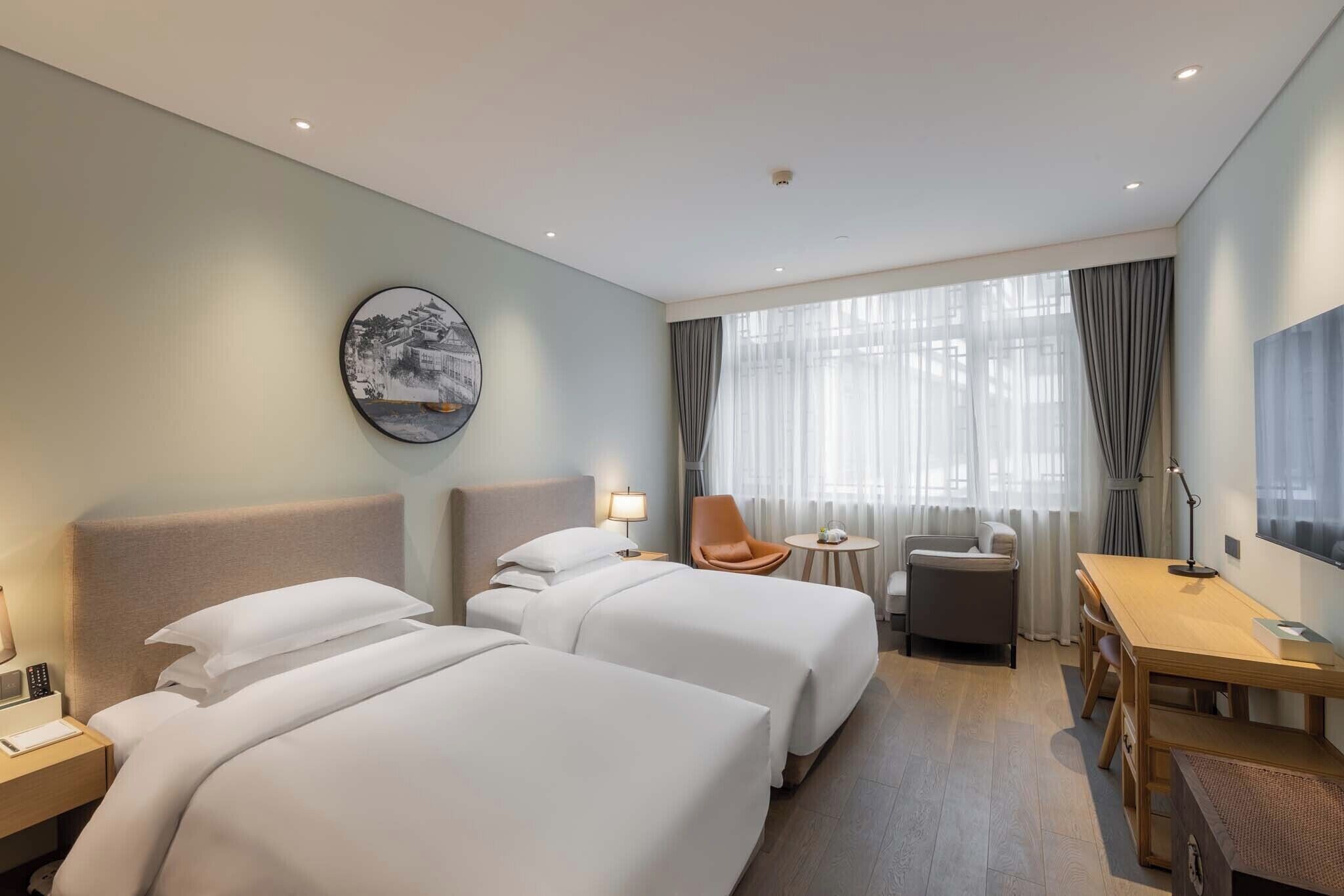 Premium bedding, individually decorated, individually furnished, desk