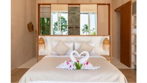 A hotel room with a bed, a window with a view of palm trees, and a wooden door. - 180° Sea View Villa | Private Infinity Pool Bang Por Koh Samui (Koh Samui)