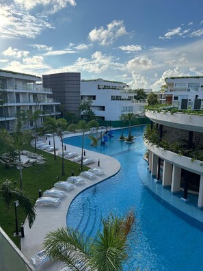Outdoor pool - Bright condo  at "The Leaf" new complex inside Playacar, a gated community. (Playa del Carmen)