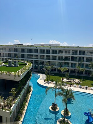 Outdoor pool - Bright condo  at "The Leaf" new complex inside Playacar, a gated community. (Playa del Carmen)