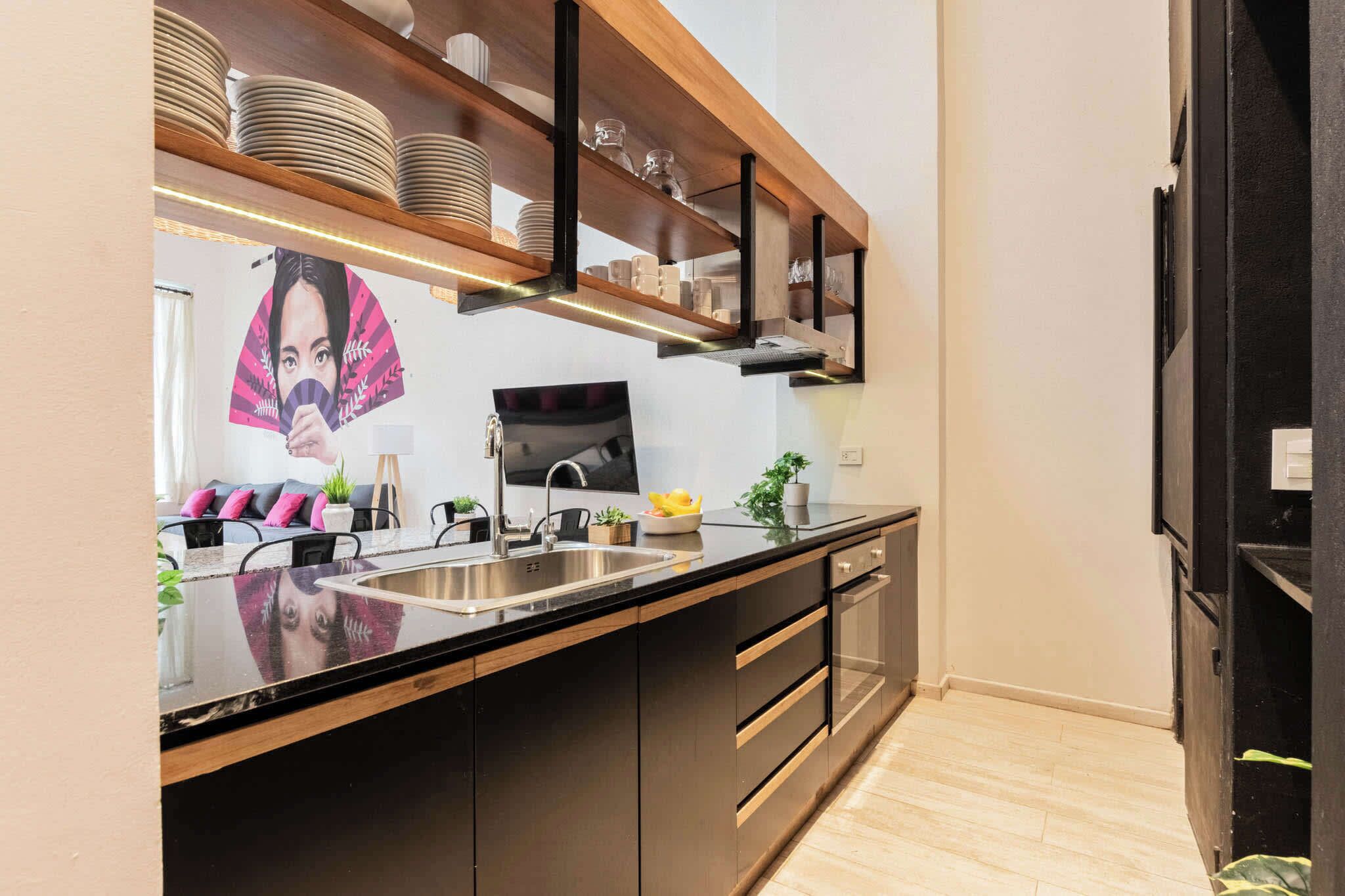 Microwave, coffee/tea maker, toaster, cookware/dishes/utensils