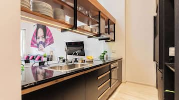 Microwave, coffee/tea maker, toaster, cookware/dishes/utensils