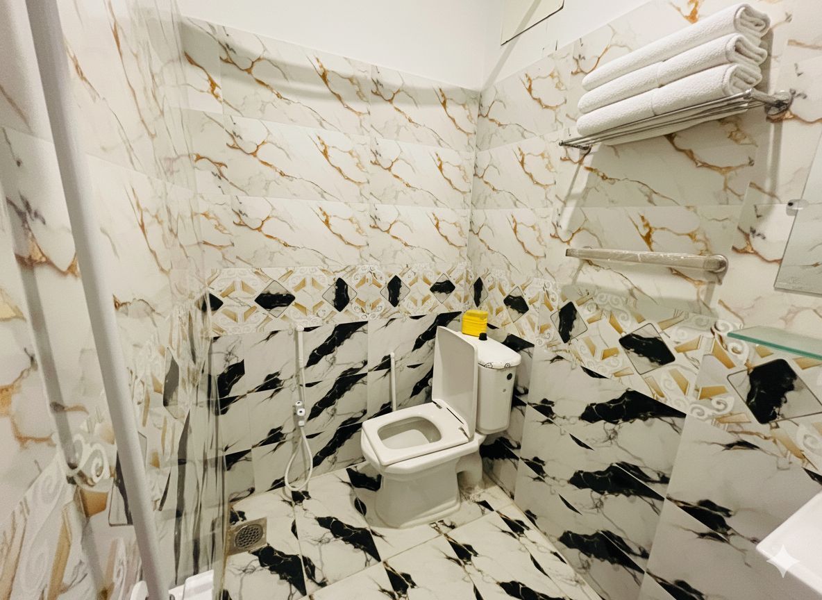 Douche, serviettes fournies, savon, papier toilette