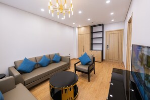 Studio, 2 Single Beds | Living area | 39-inch flat-screen TV with cable channels - Herring Beach Hotel Phu Quoc (Duong To)