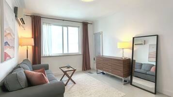 Deluxe suite, uitzicht op de stad | Woonruimte