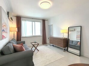 Suite Deluxe, vista città | Area soggiorno